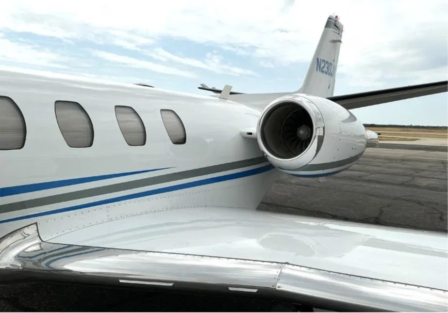 Exterior view of a 2003 CESSNA CITATION ENCORE, N230JK.