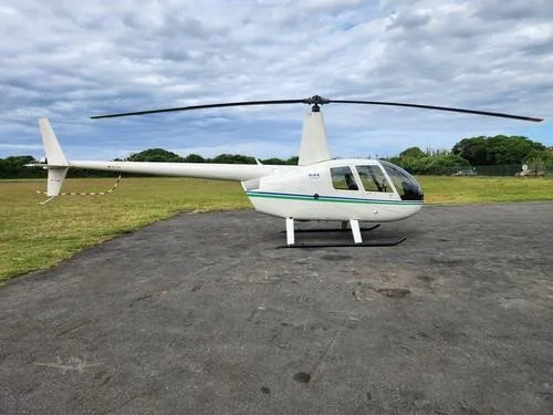 Exterior view of a 2001 ROBINSON R44 RAVEN I.