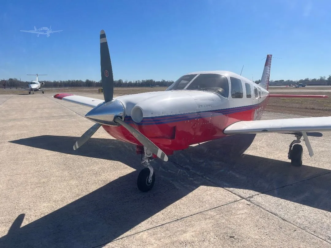 Exterior view of a 2003 PIPER SARATOGA II HP, N637JD.