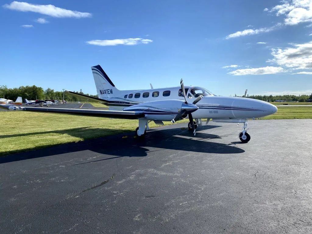 Exterior view of a 1980 CESSNA CONQUEST II, N441EM.