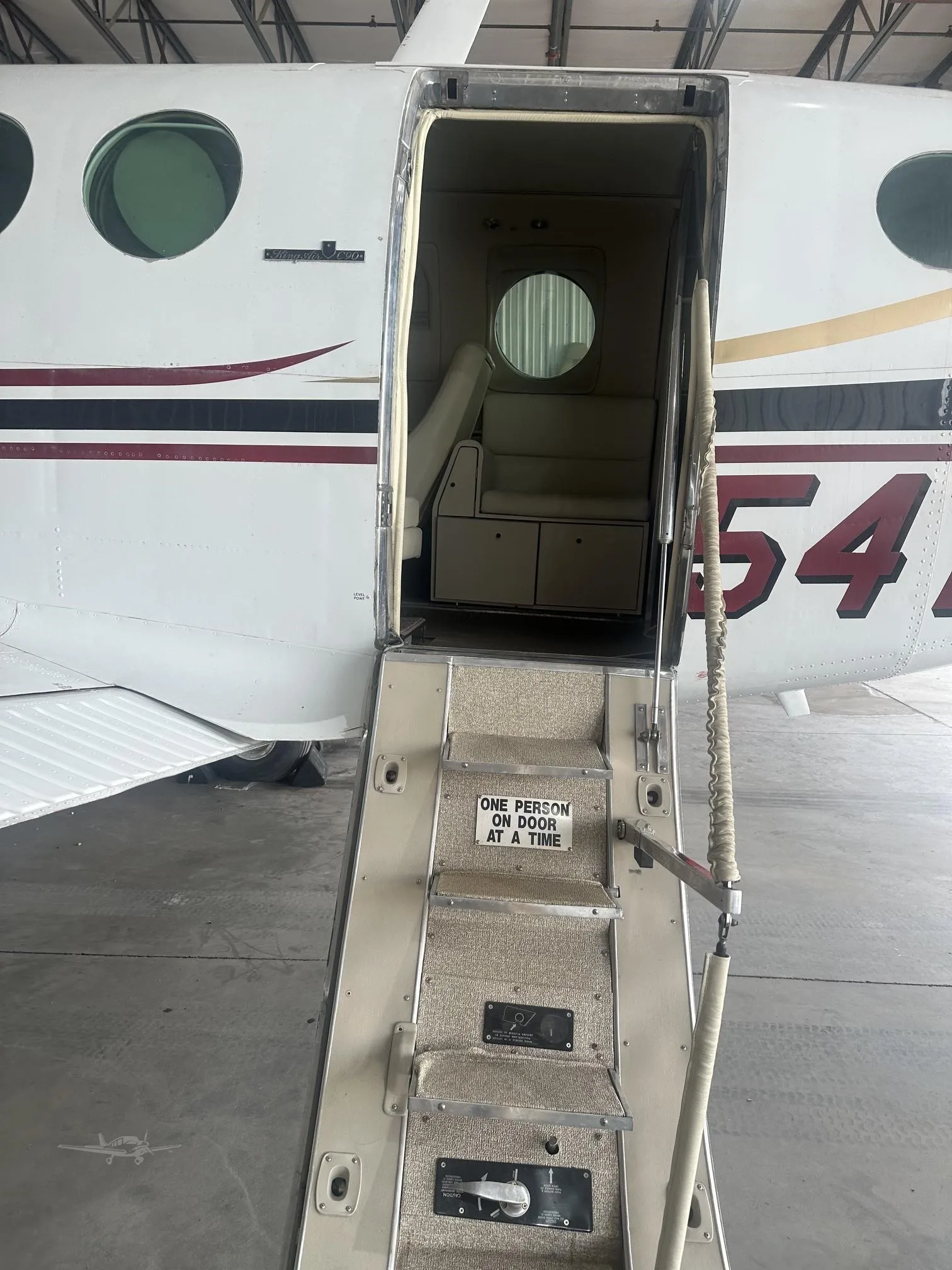 Exterior view of a 1978 BEECHCRAFT KING AIR C90, N754TW.