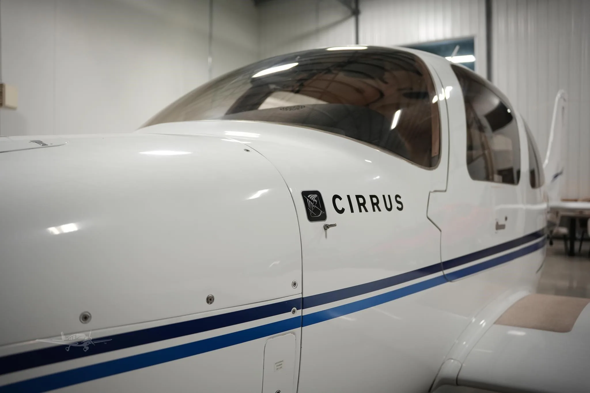 Exterior view of a 2003 CIRRUS SR20, C-GGDS.