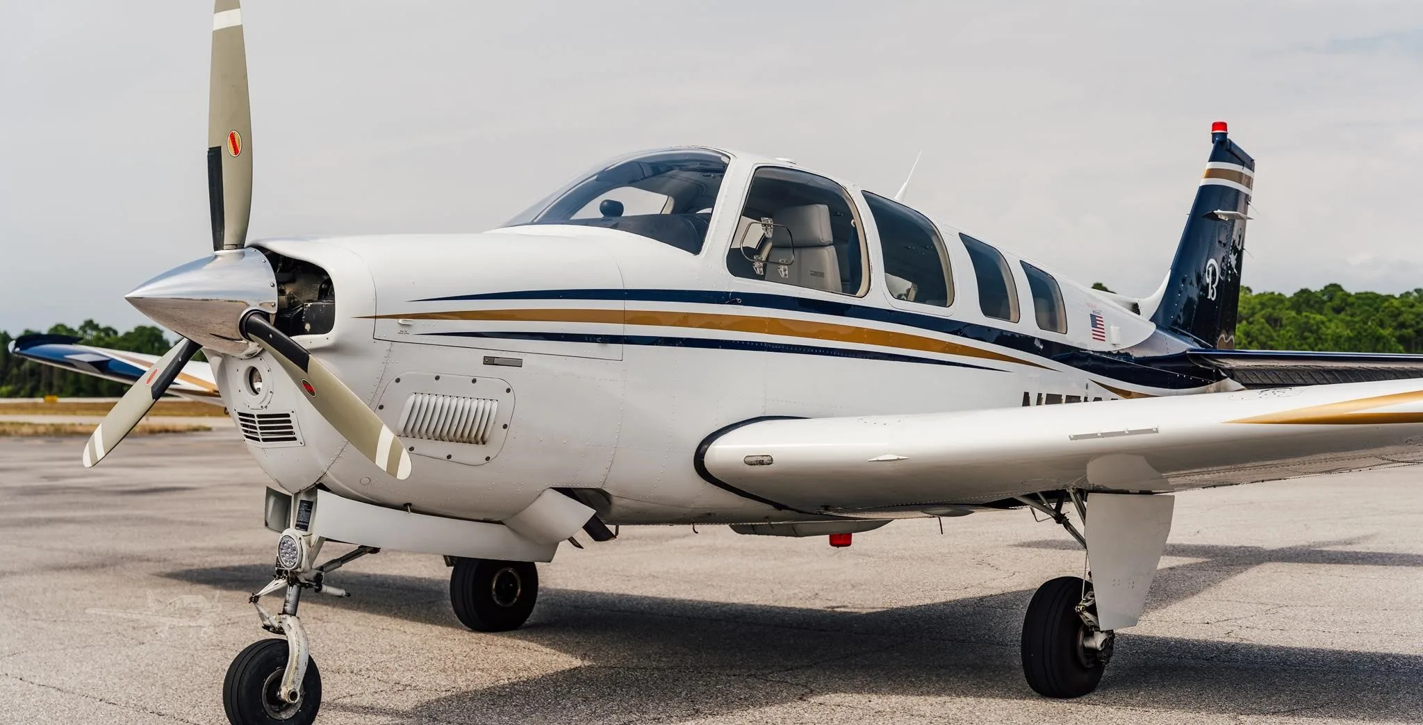 Exterior view of a 2006 BEECHCRAFT G36 BONANZA, N771CG.