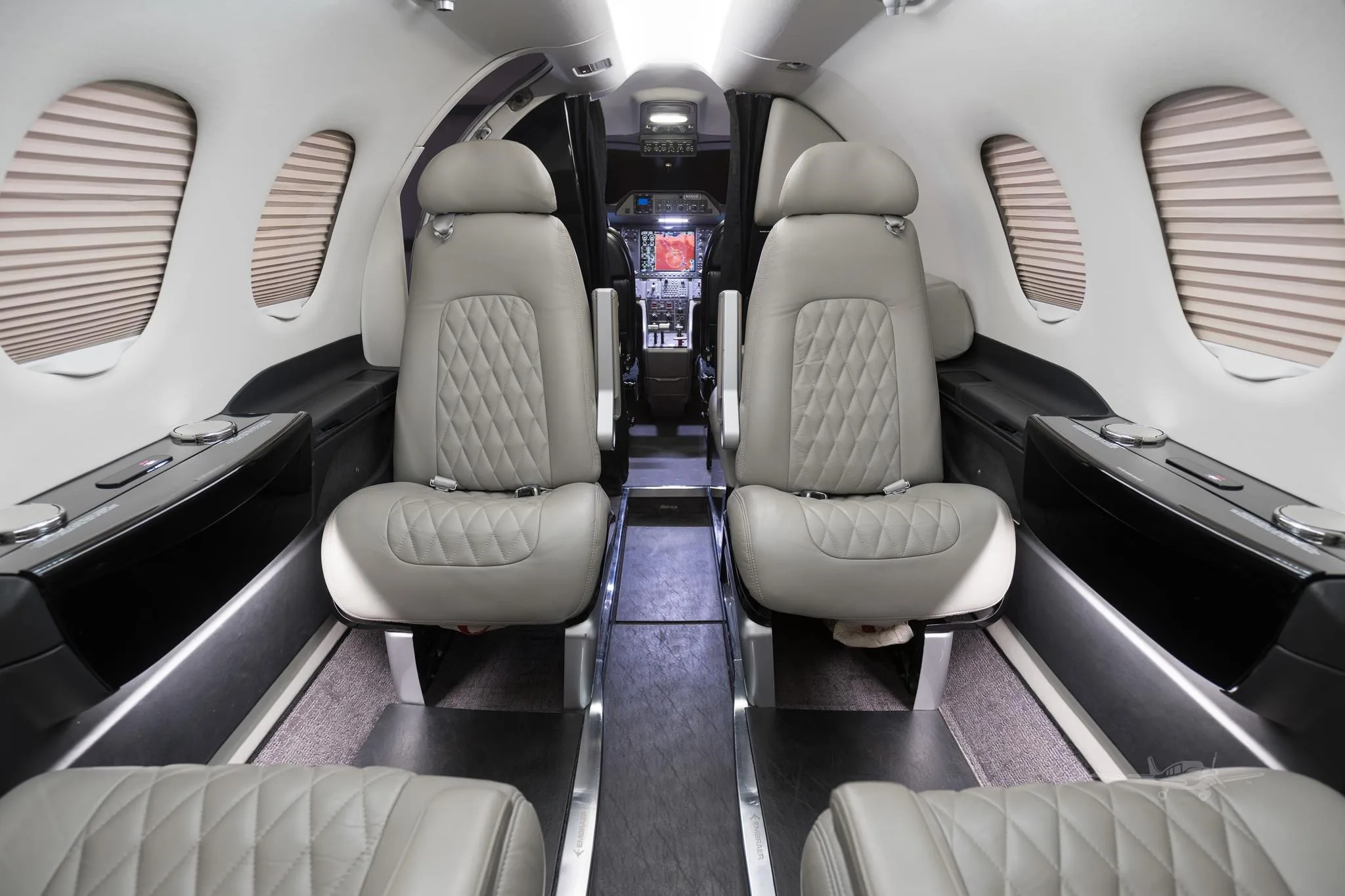 Cabin interior of a 2013 EMBRAER PHENOM 100.