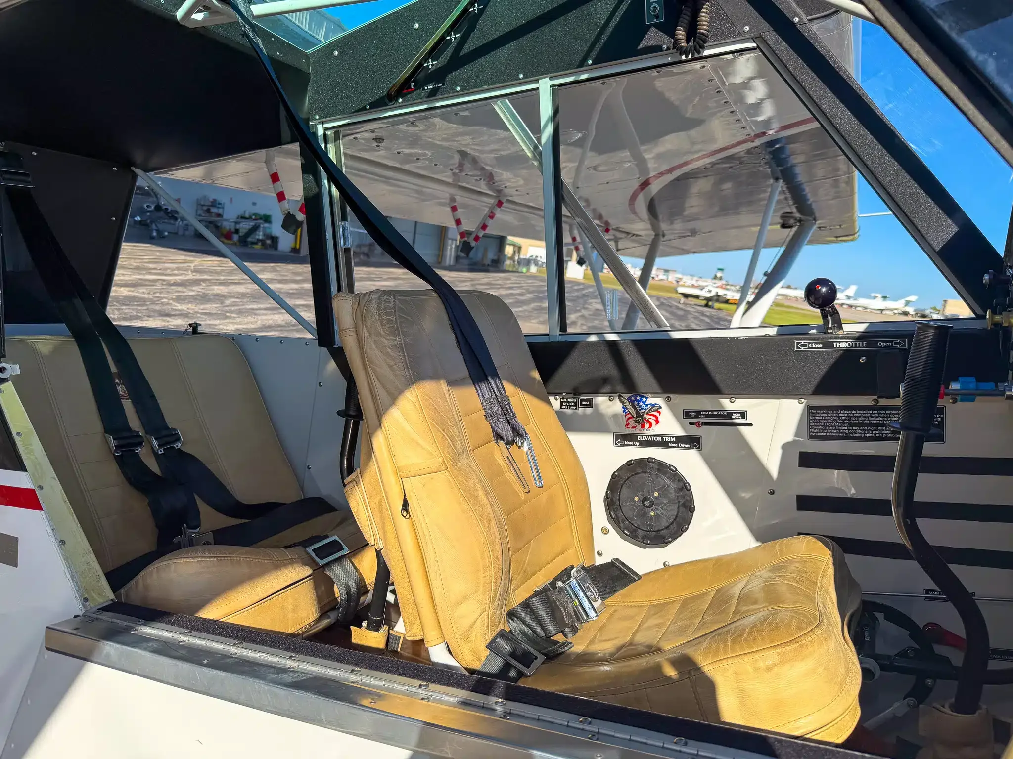 Exterior view of a 2010 Aviat A-1C Husky, N409BW.