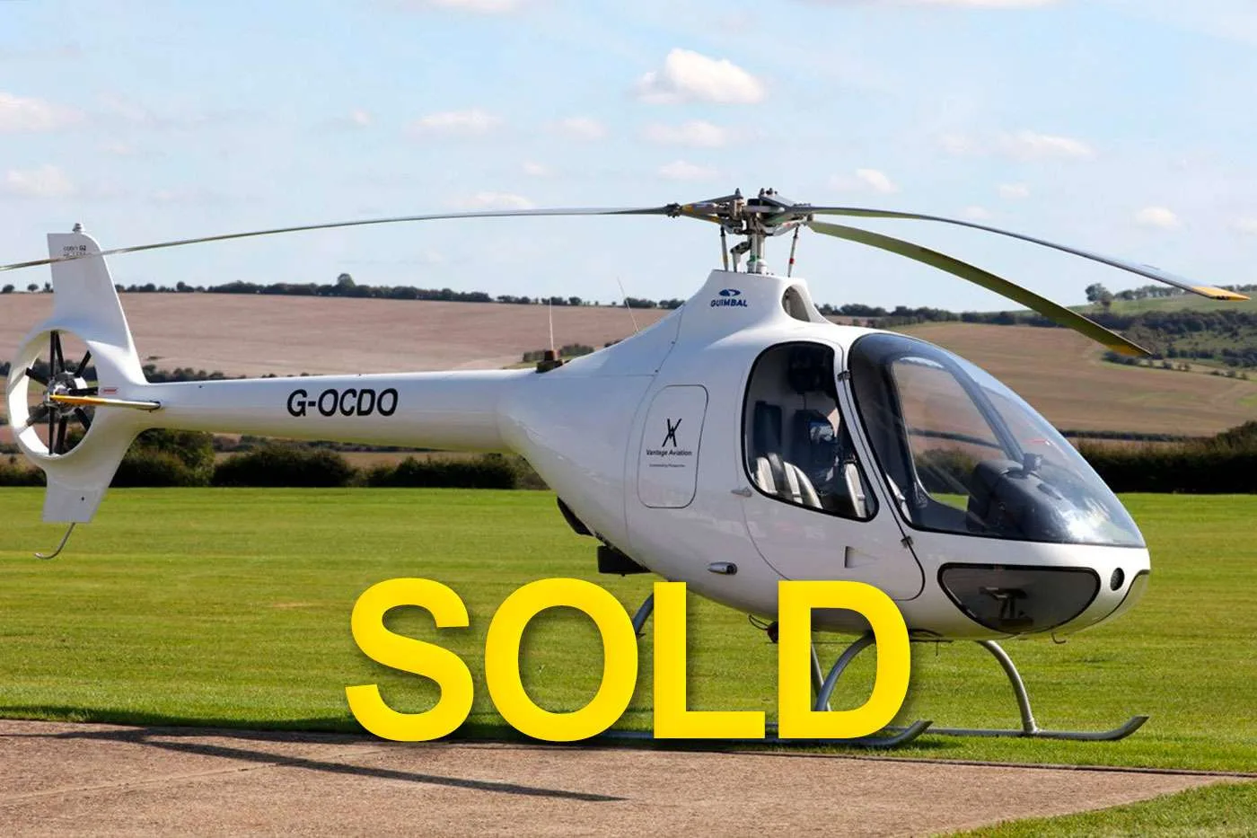 Exterior view of a 2002 Robinson R44 Raven I.