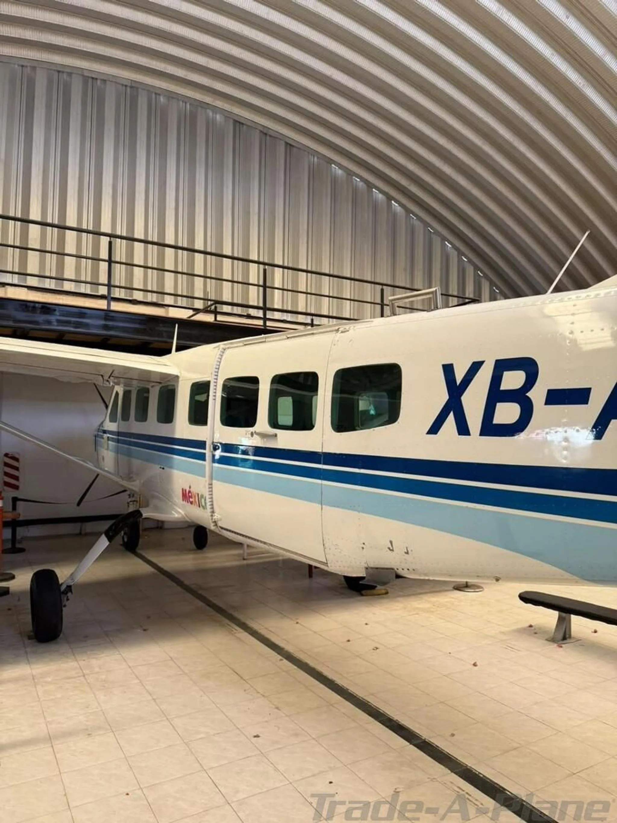 Exterior view of a 1995 CESSNA 208B GRAND CARAVAN, XB-ABT.