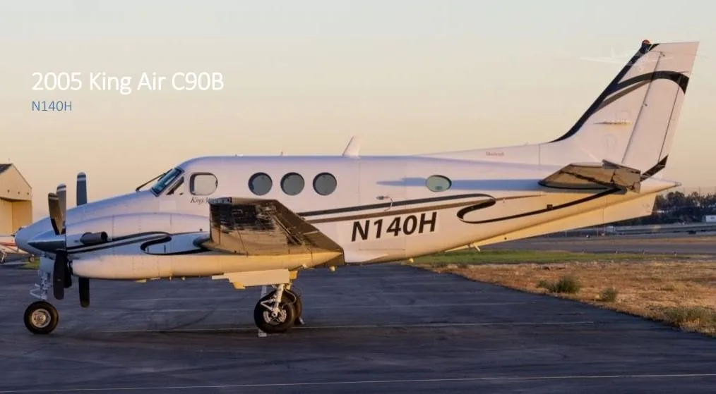 Exterior view of a 2005 BEECHCRAFT KING AIR C90B, N140H.