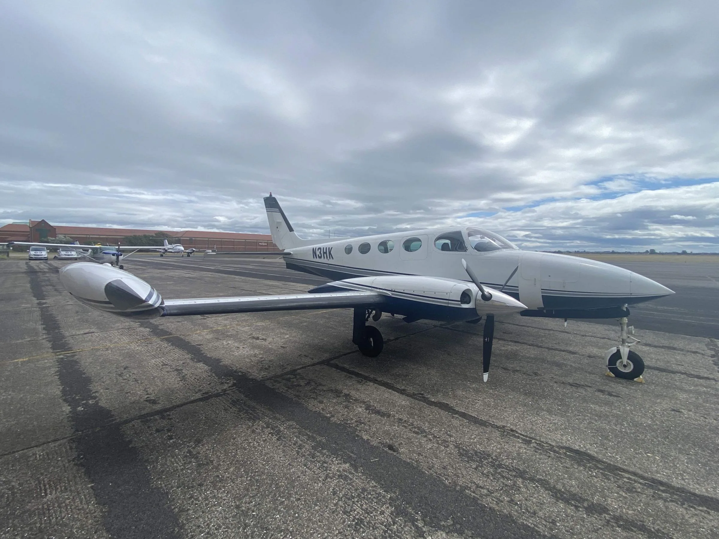 Exterior view of a 1975 Cessna 340, N3HK.
