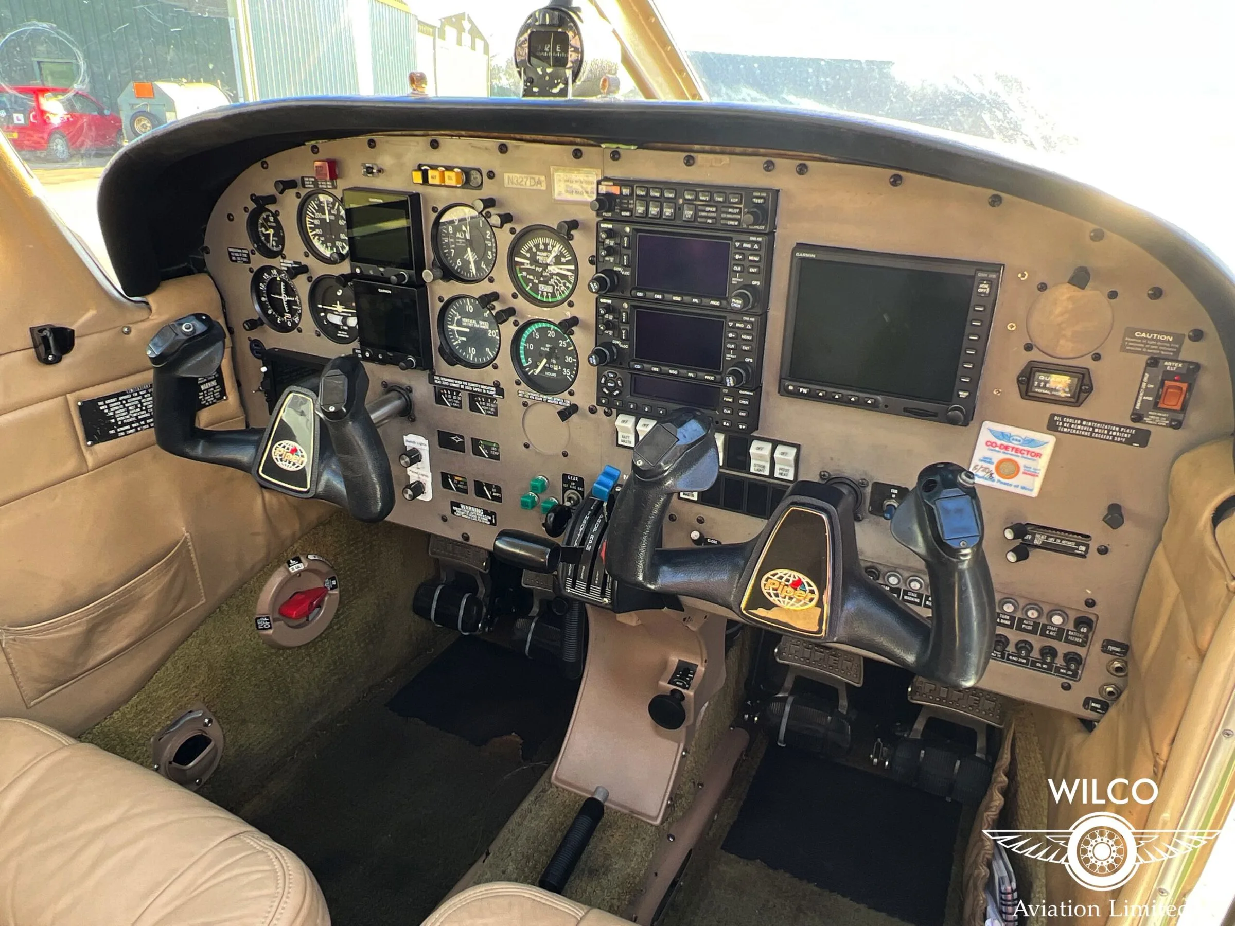 Cockpit and instrument panel of a 2002 Piper PA-28R-201 Arrow III.