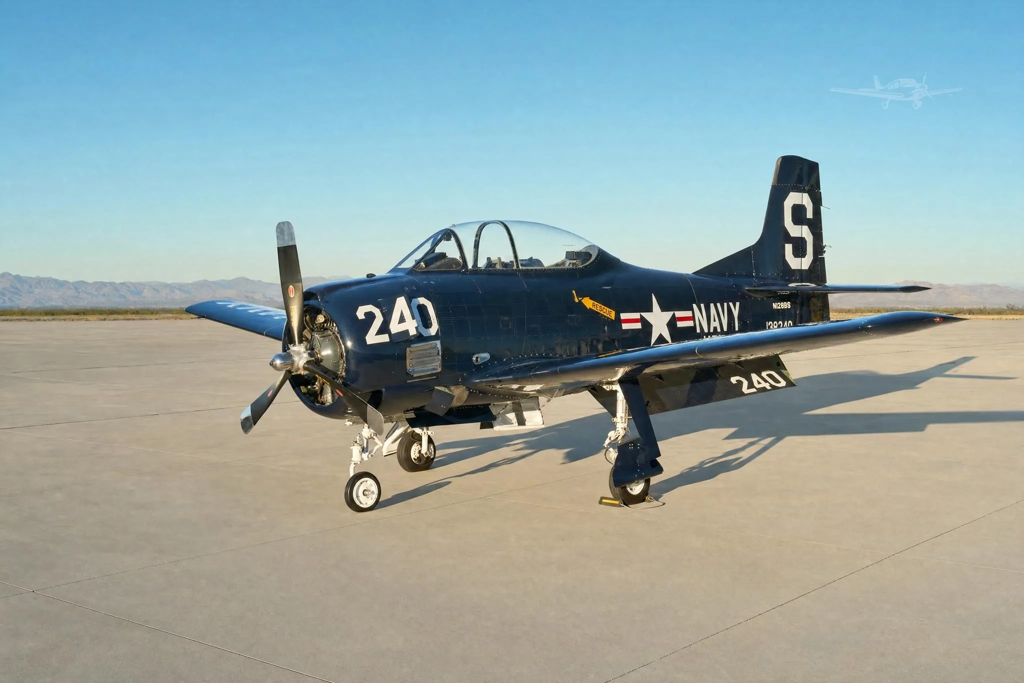 Exterior view of a 1955 NORTH AMERICAN T28B, N128BS.
