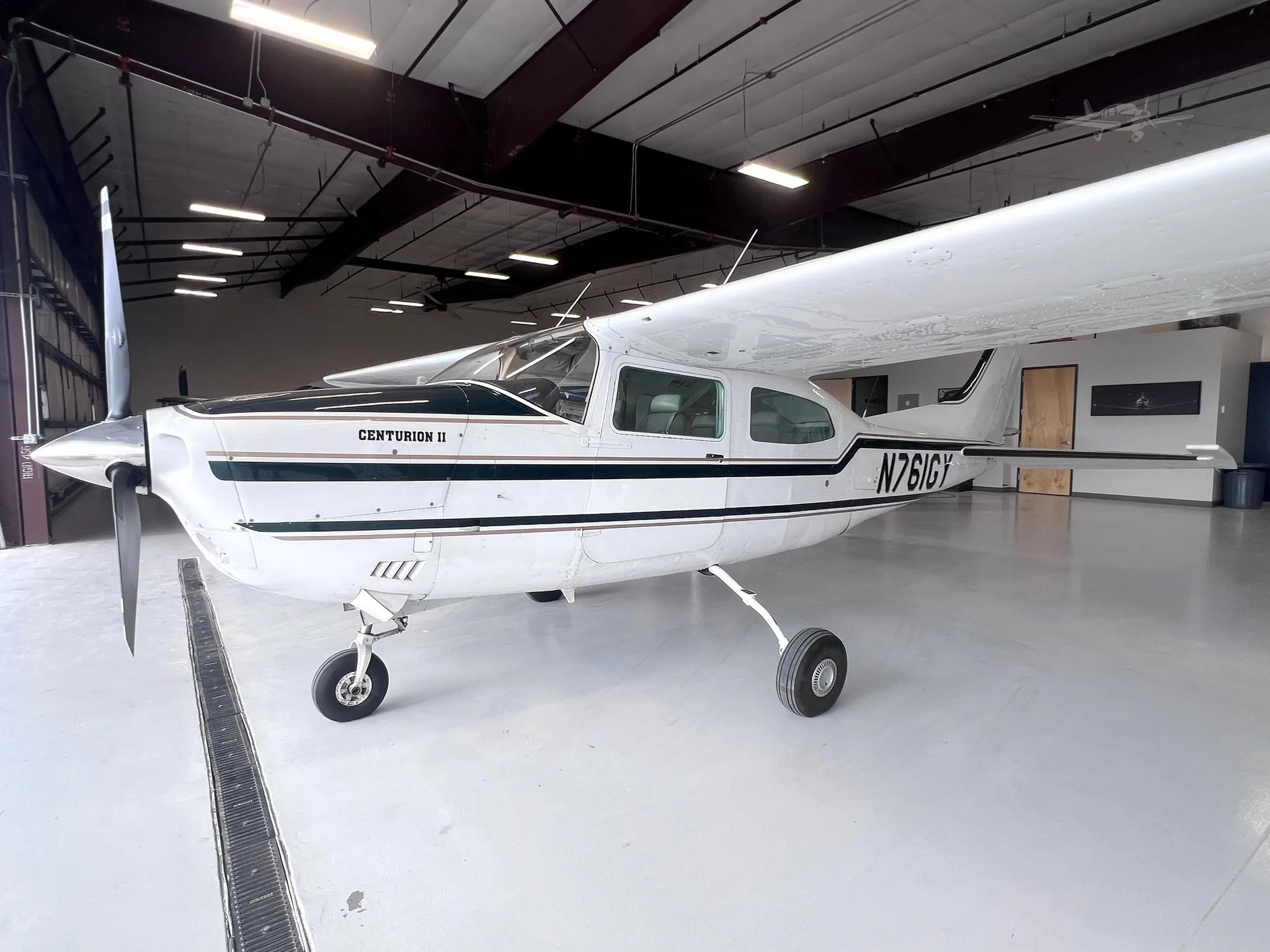 Exterior view of a 1977 CESSNA TURBO 210M, N761GY.