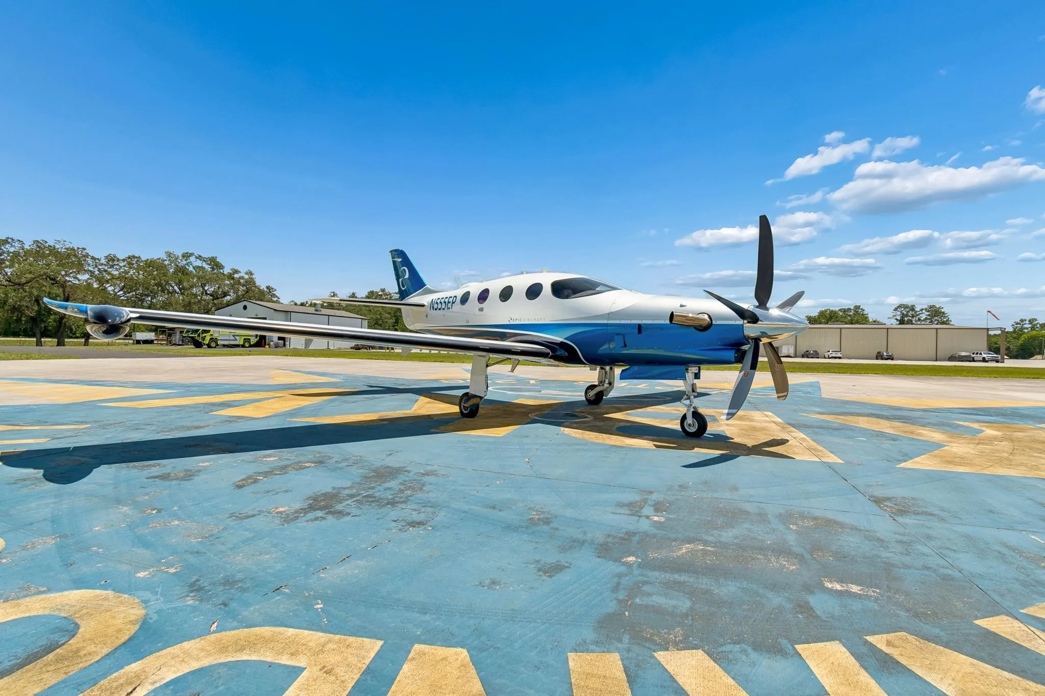 Exterior view of a 2025 EPIC E1000 GX, N555EP.