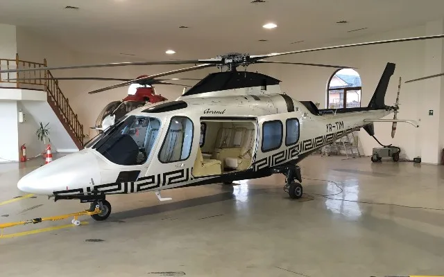 Exterior view of a 2010 Agusta A109 Grand, YR-TIM.