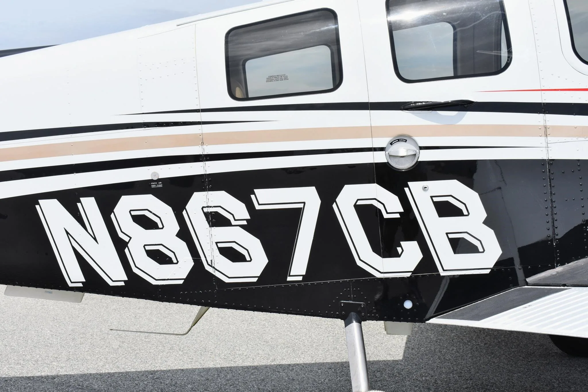 Exterior view of a 2015 BEECHCRAFT G36 BONANZA, N867CB.