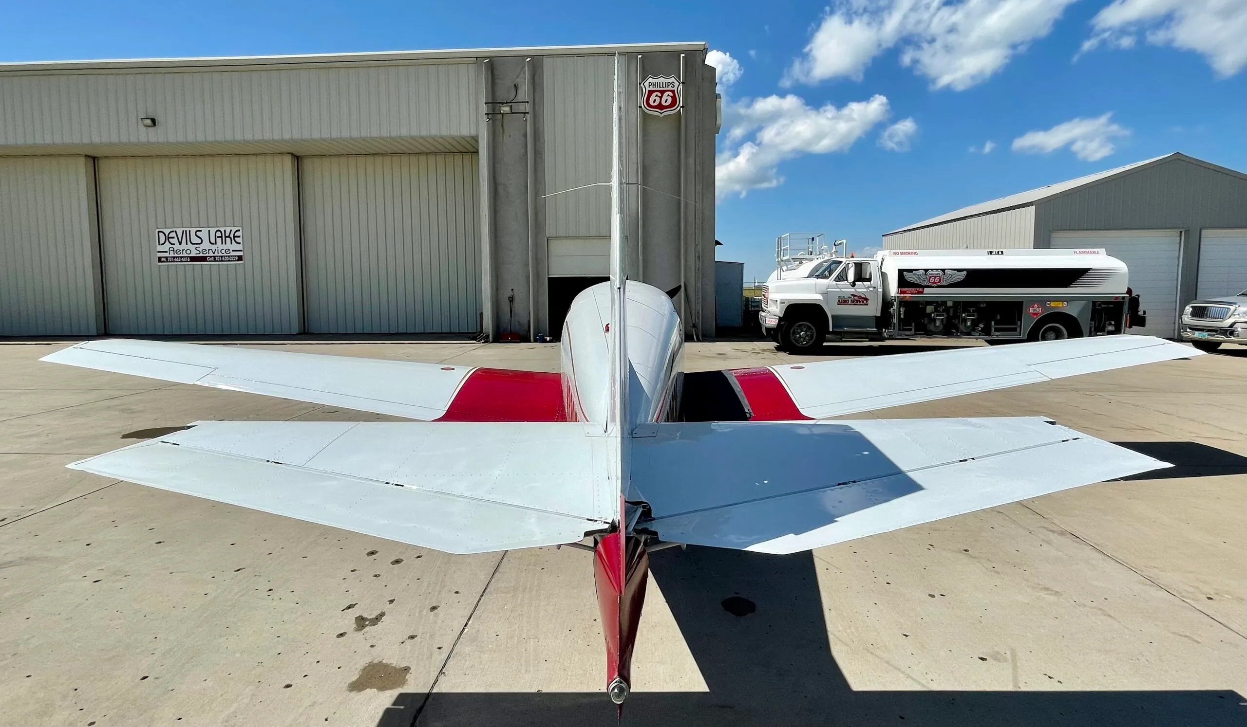 Exterior view of a 1967 Mooney M20C, N3203F.
