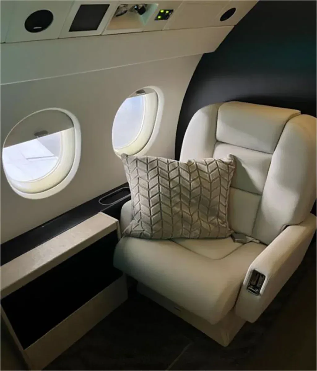 Cabin interior of a 1995 Dassault Falcon 900B.