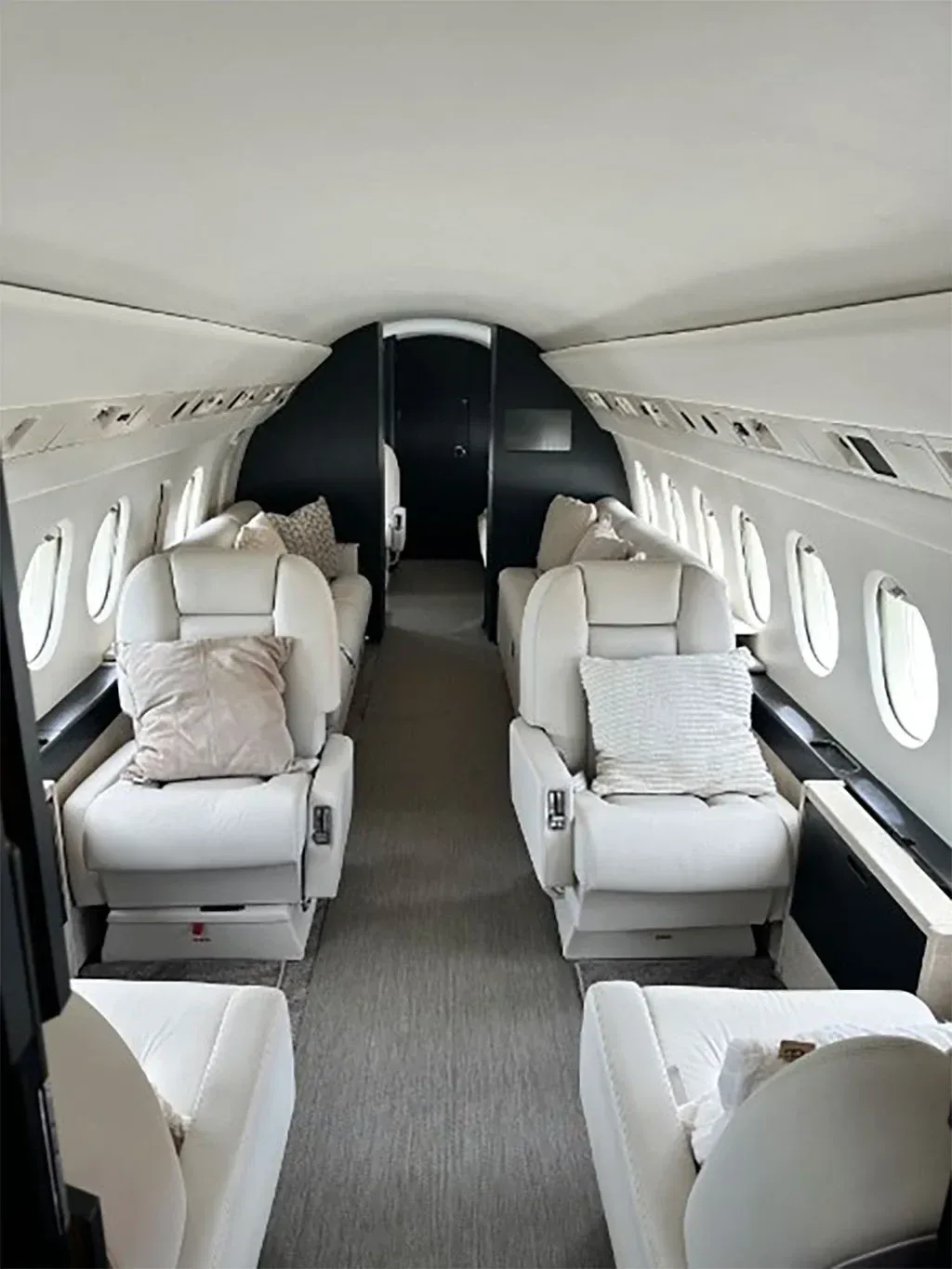 Cabin interior of a 1995 Dassault Falcon 900B.