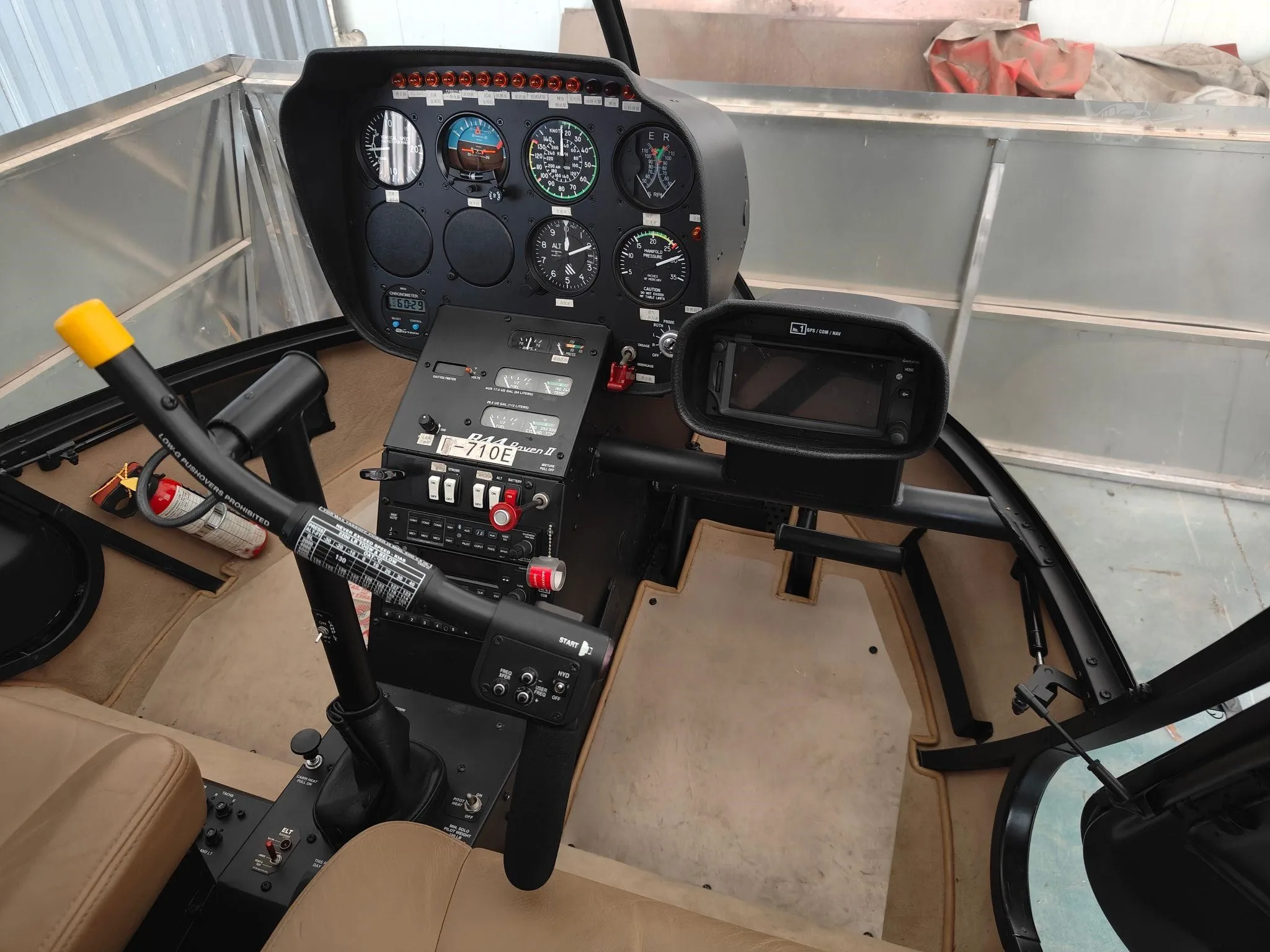 Cockpit and instrument panel of a 2018 ROBINSON R44 RAVEN II.