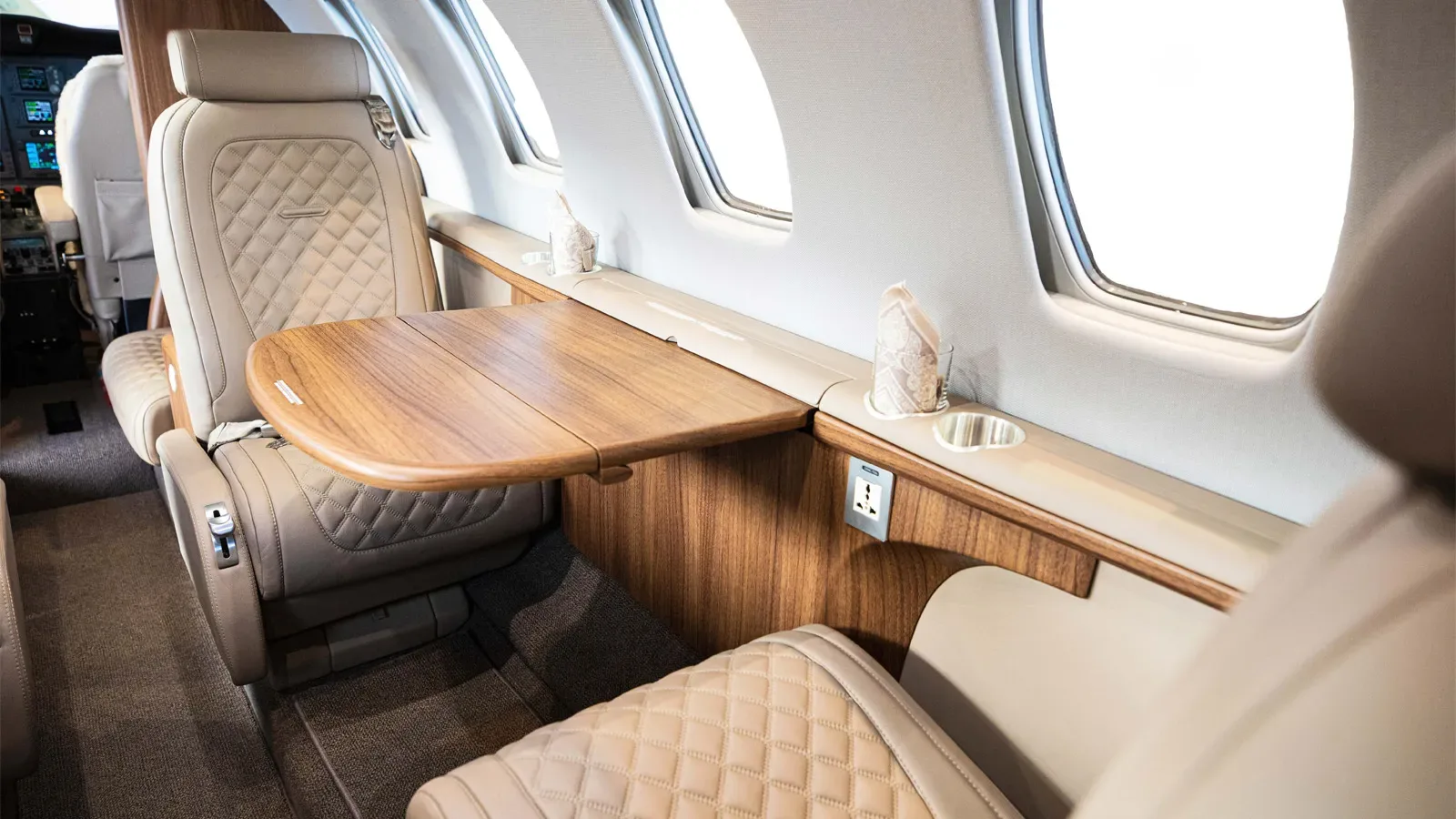 Cabin interior of a 2006 Cessna Citation Jet 1+.