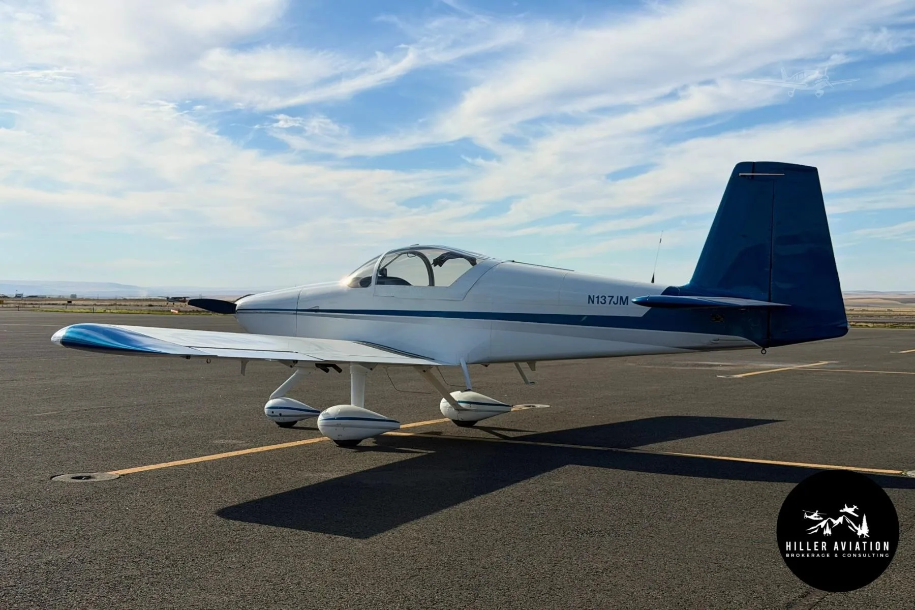 Exterior view of a 2006 VANS RV-9A, N137JM.