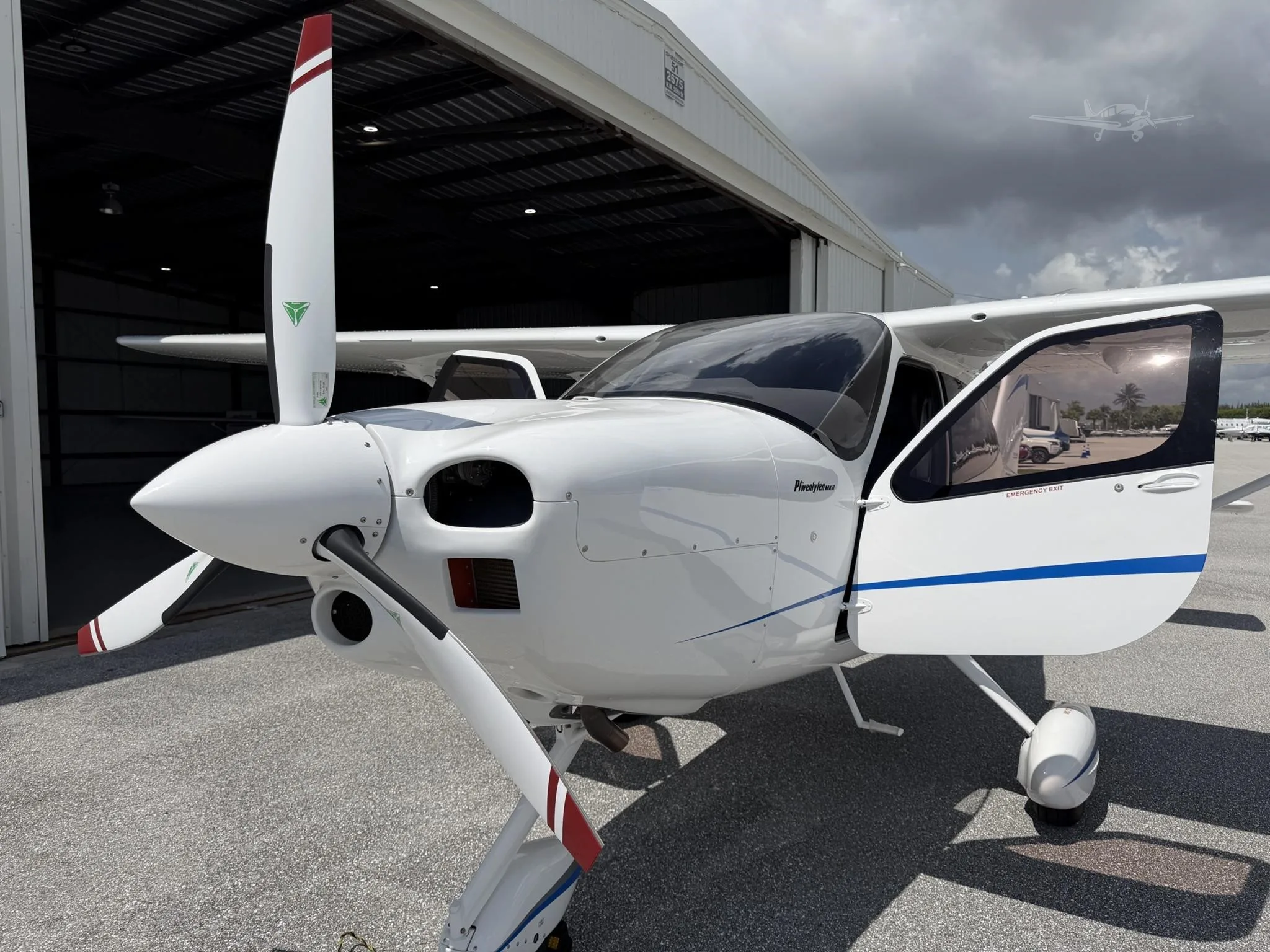 Exterior view of a 2025 TECNAM P2010 MKII, N320UV.