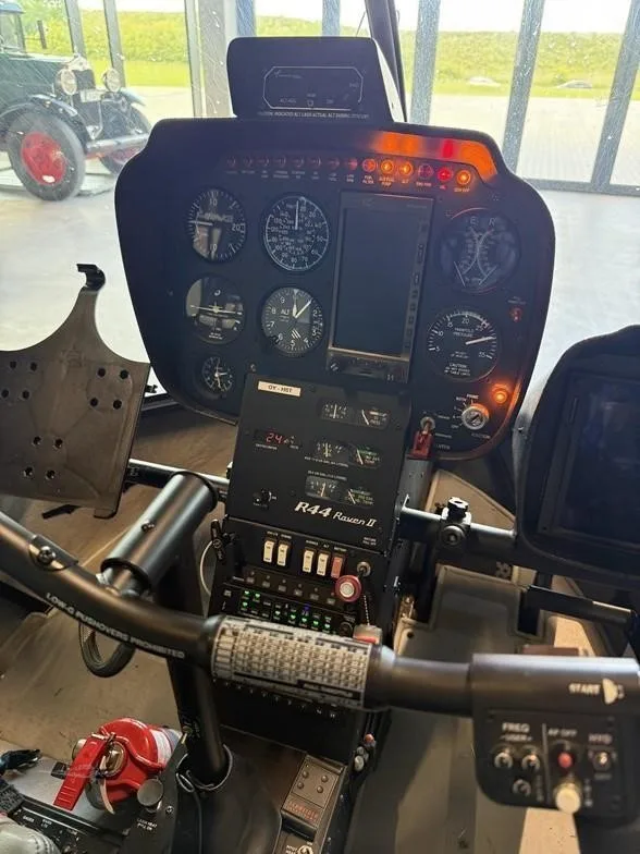 Cockpit and instrument panel of a 2017 ROBINSON R44 RAVEN II.