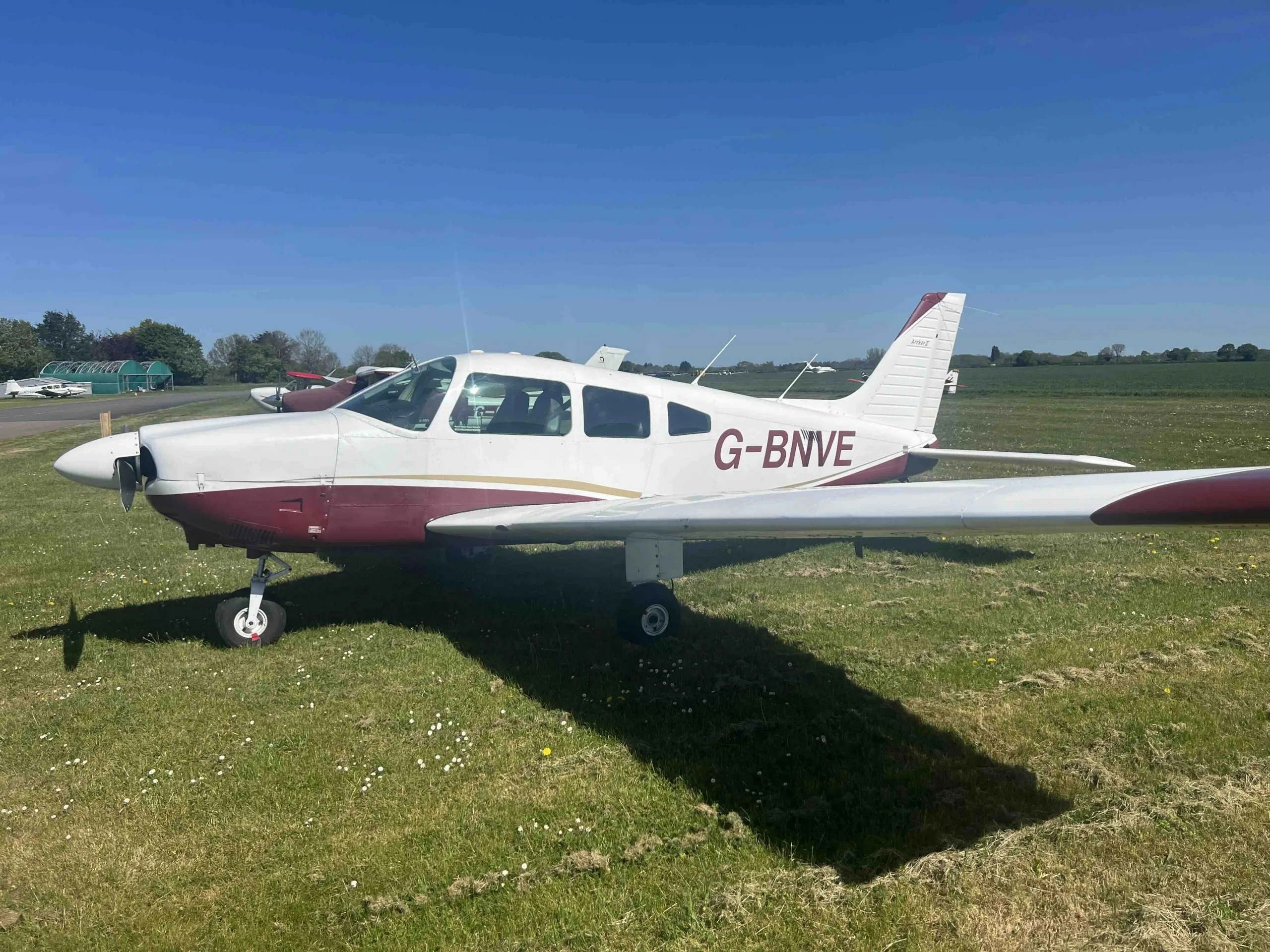 Exterior view of a 1984 Piper PA28-181 Archer II.