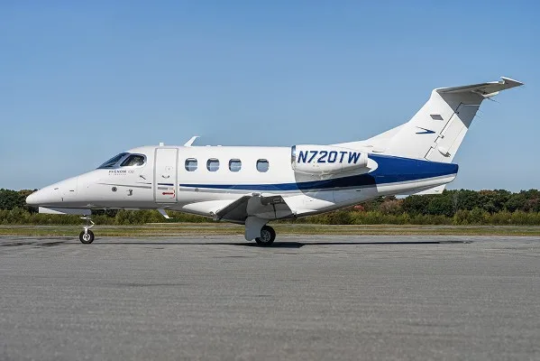 Marketing image of a 2013 Embraer Phenom 100.