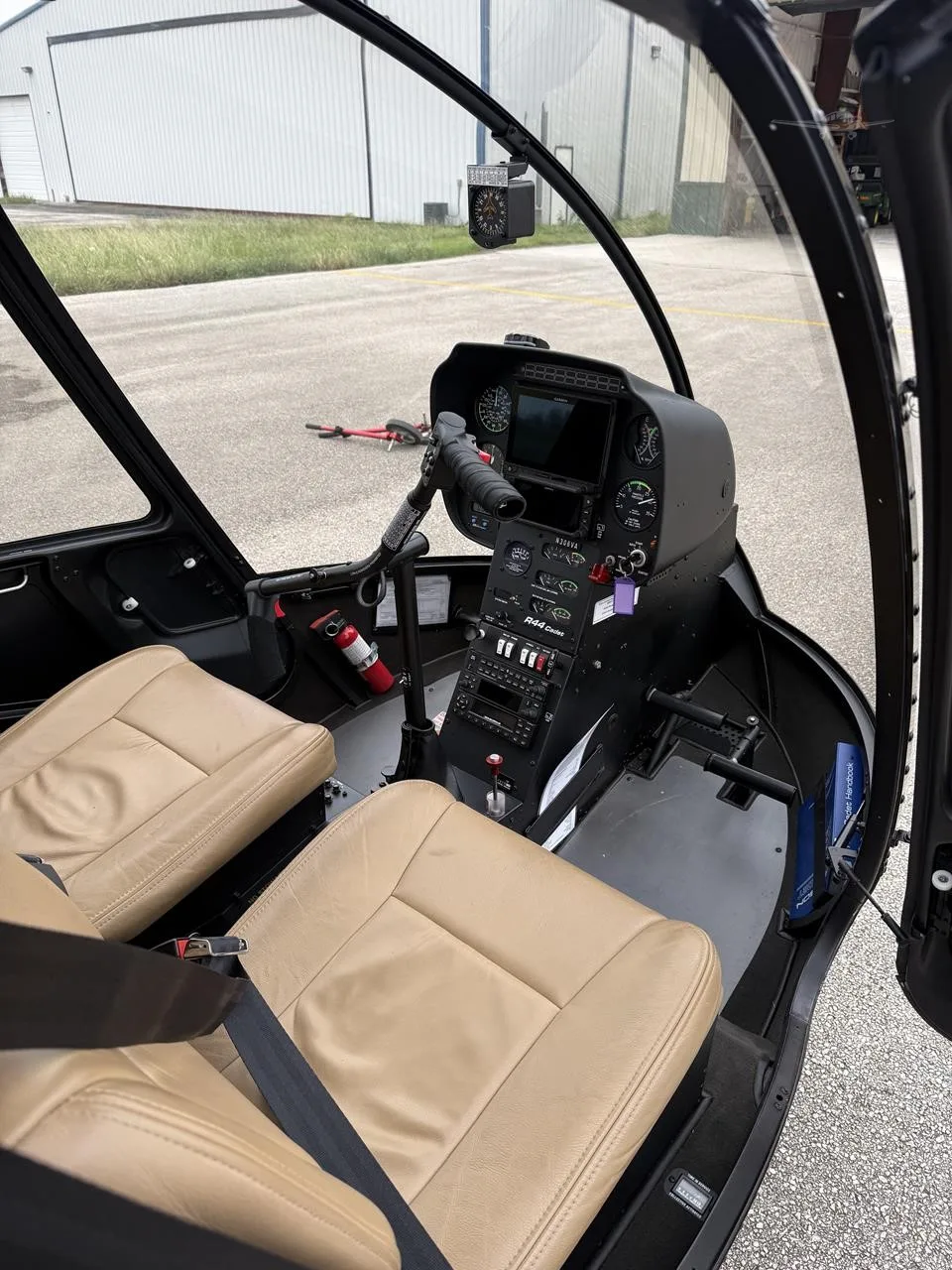 Cockpit and instrument panel of a 2025 ROBINSON R44 CADET.