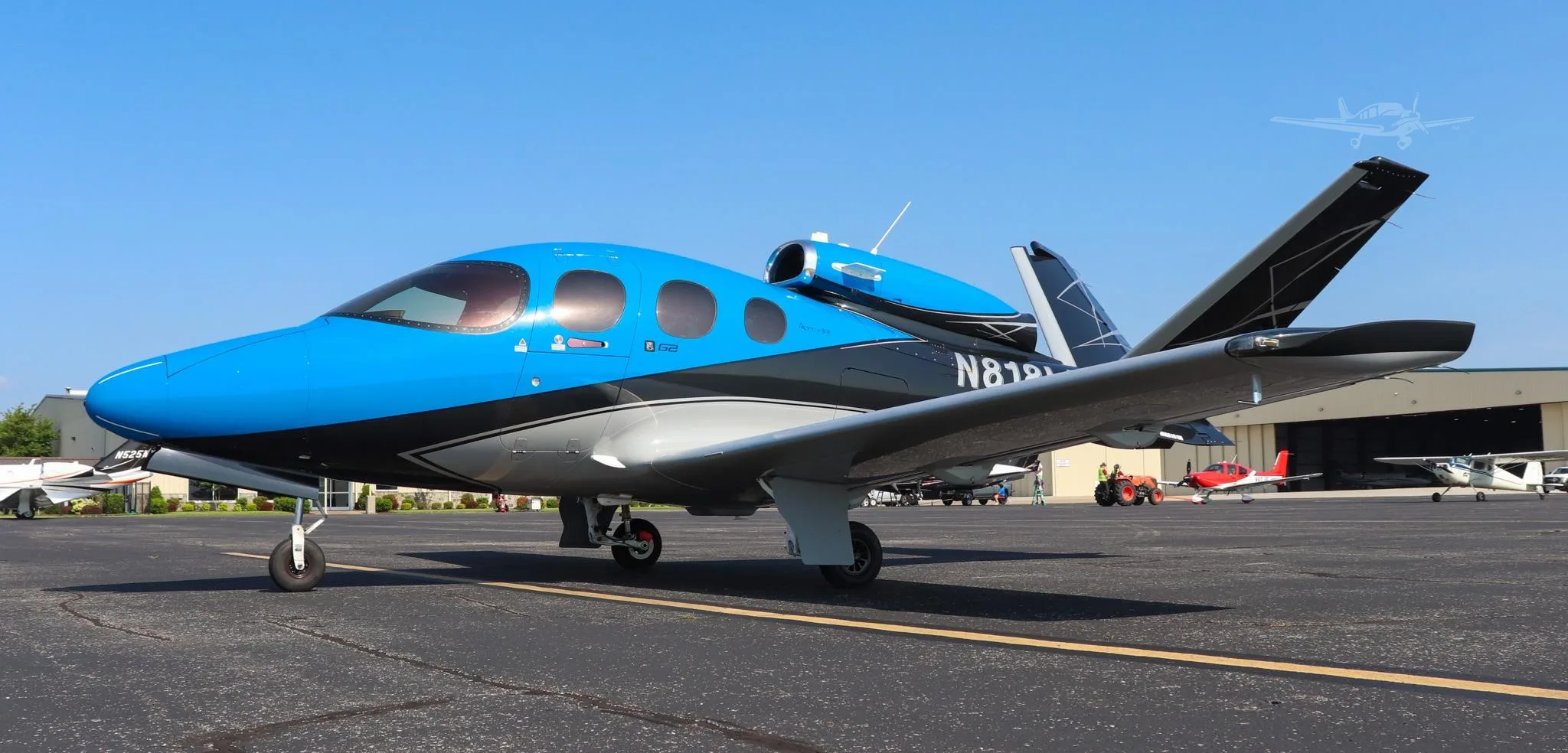 Exterior view of a 2021 CIRRUS VISION SF50-G2+, N818LL.