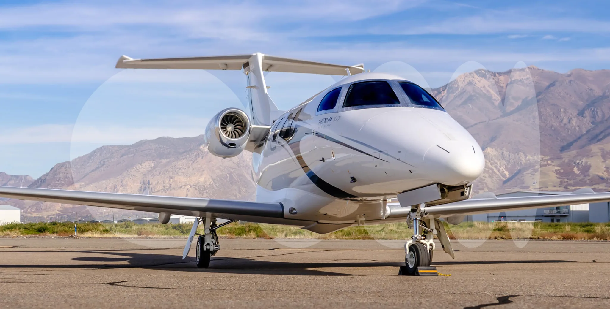 Exterior view of a 2009 Embraer Phenom 100.