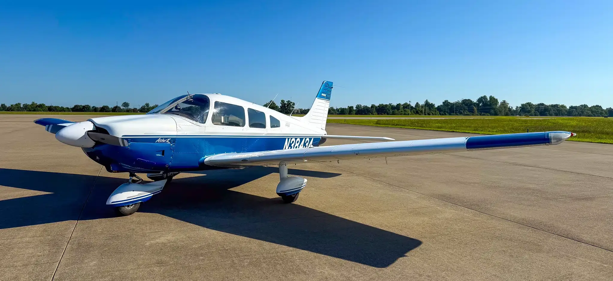 Exterior view of a 1983 Piper Turbo Saratoga, N4299X.