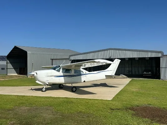Exterior view of a 1979 Cessna 210N, ZS-NFH.