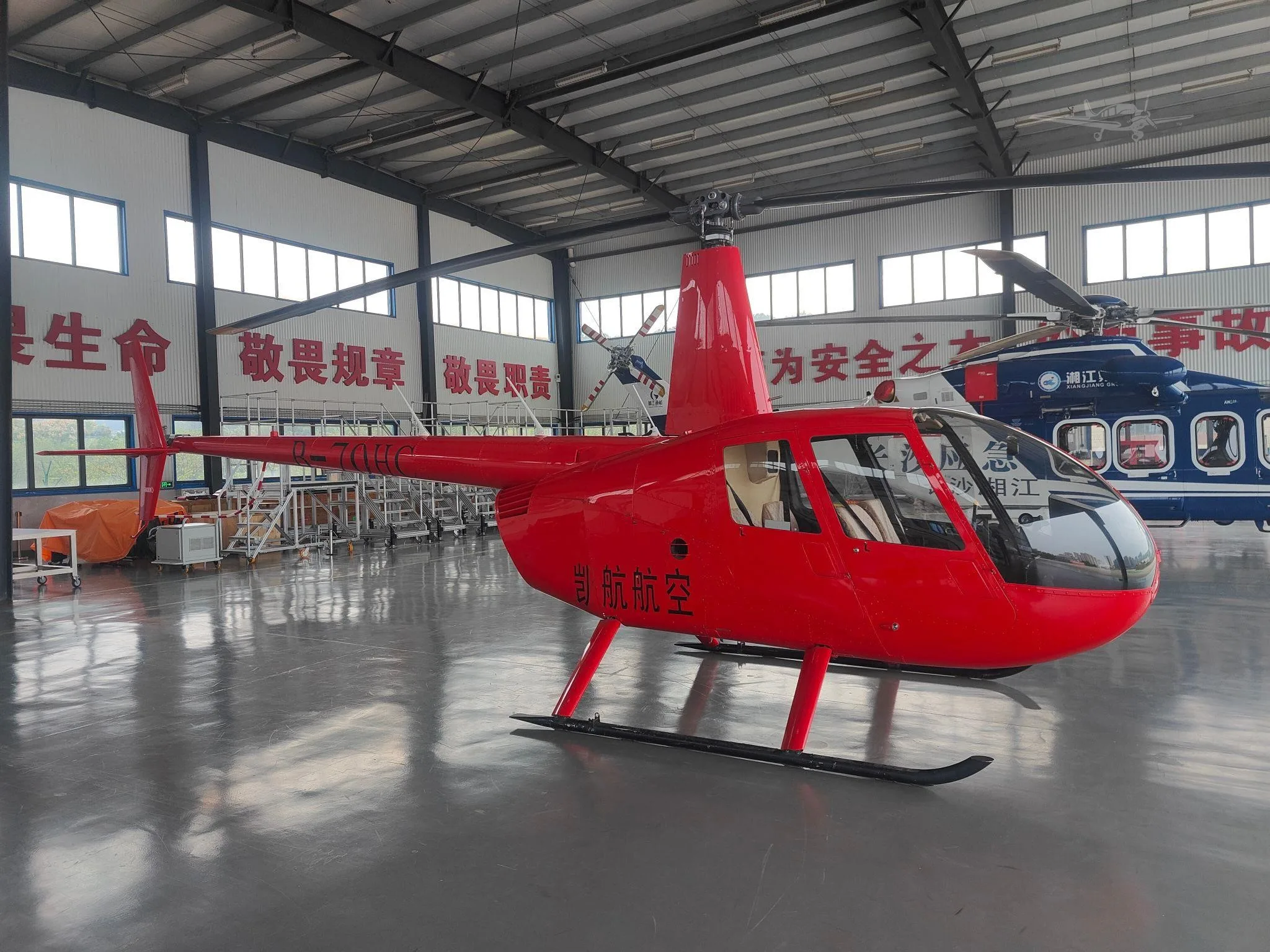 Exterior view of a 2015 ROBINSON R44 RAVEN II, B-70HC.