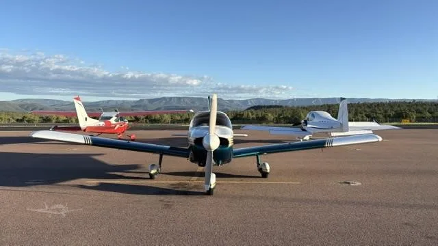 Exterior view of a 1966 PIPER CHEROKEE 180, N5924W.