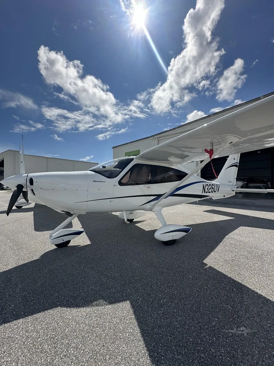 Exterior view of a 2025 TECNAM P2010 MKII, N326UV.
