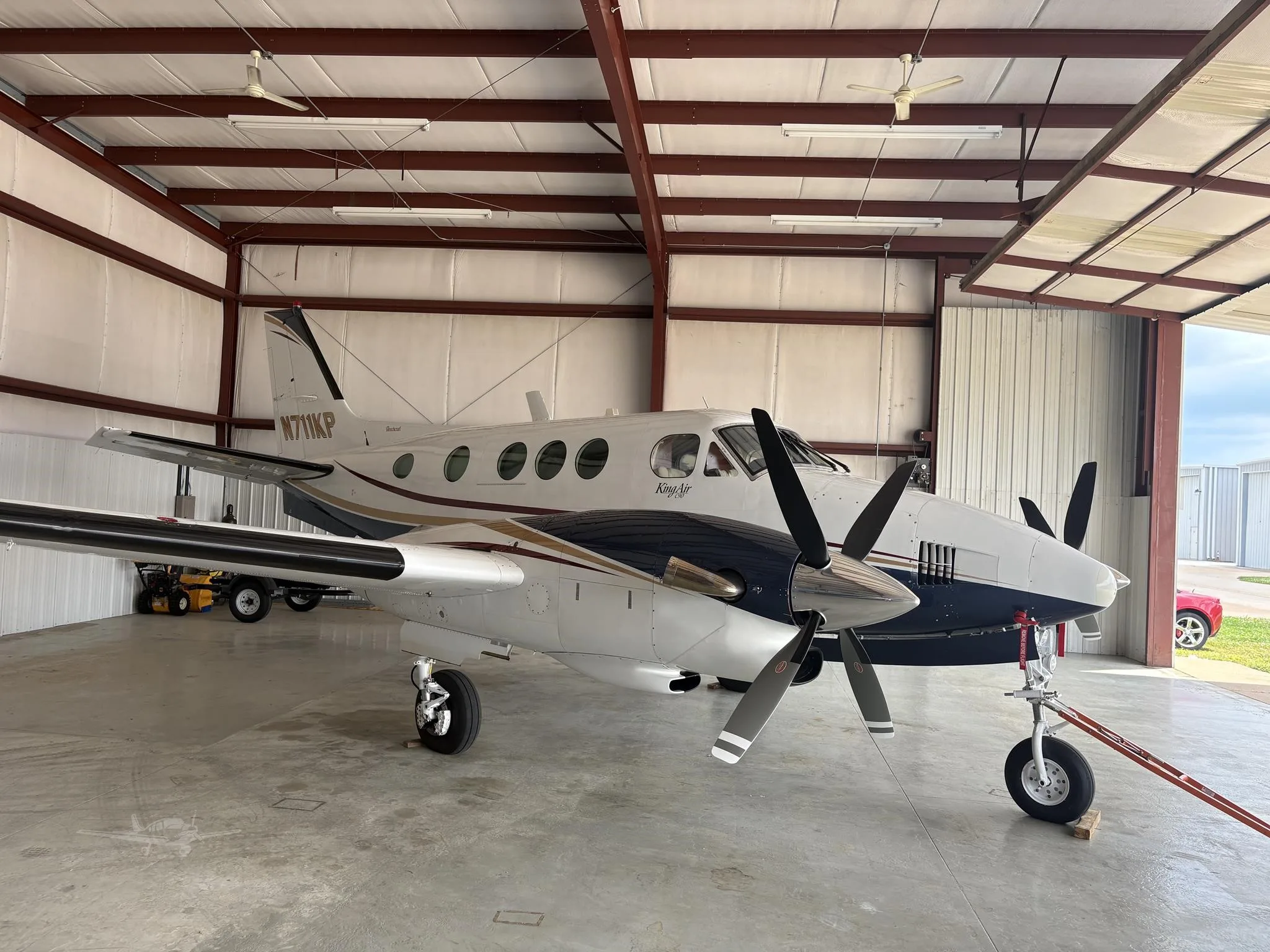 Exterior view of a 1976 BEECHCRAFT KING AIR C90, N711KP.