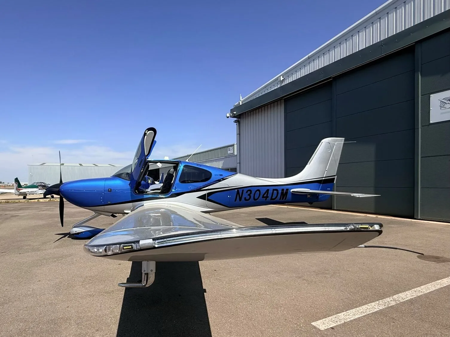Exterior view of a 2024 Cirrus SR22-G7 TURBO, N304DM.