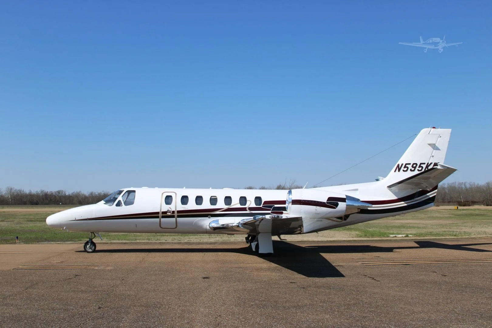 Exterior view of a 2002 CESSNA CITATION ENCORE, N595KW.