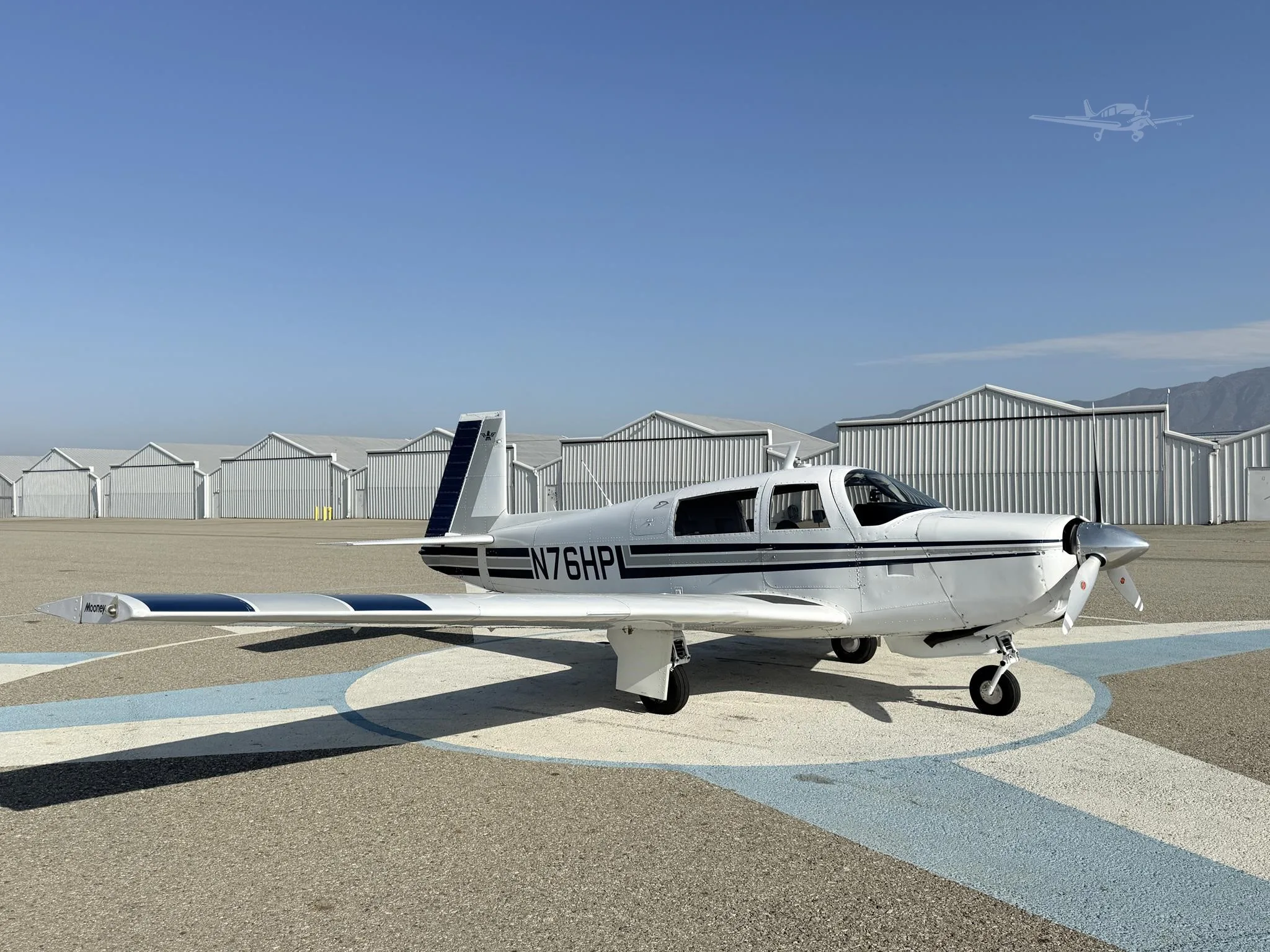 Exterior view of a 1970 MOONEY M20F, N76HP.