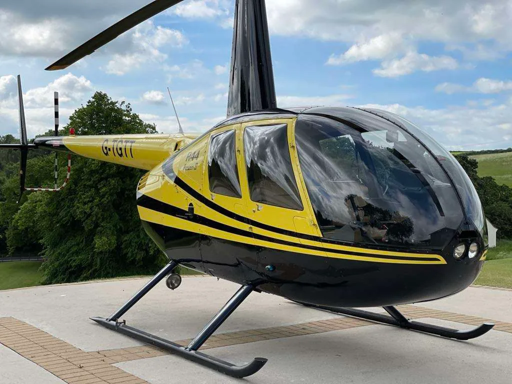 Marketing image of a 2002 Robinson R44 Raven II.