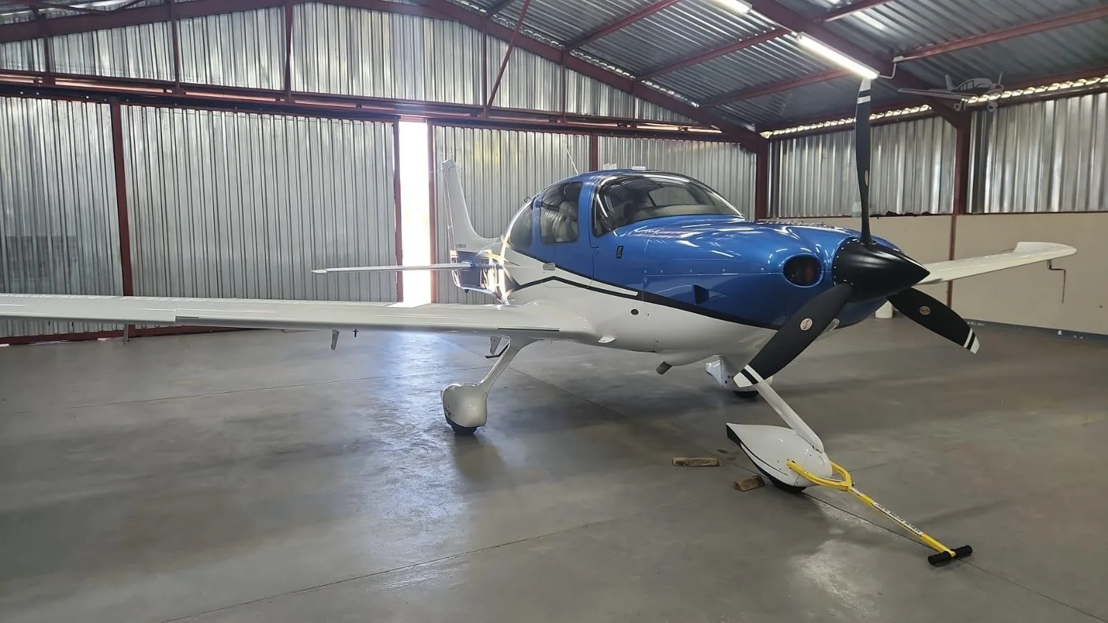 Exterior view of a 2017 CIRRUS SR22-G6, ZS-ISP.