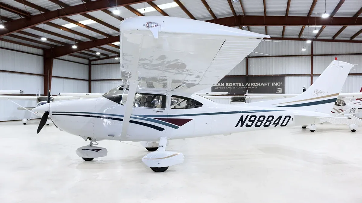 Exterior view of a 1961 Cessna 182D, N8763X.