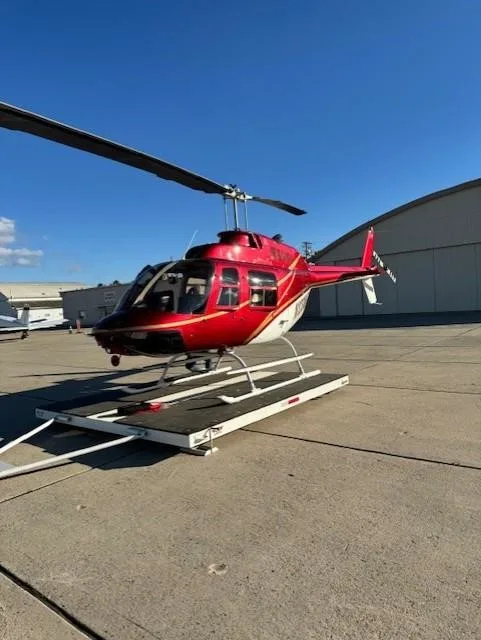 Exterior view of a 1980 BELL 206B III, N123WF.