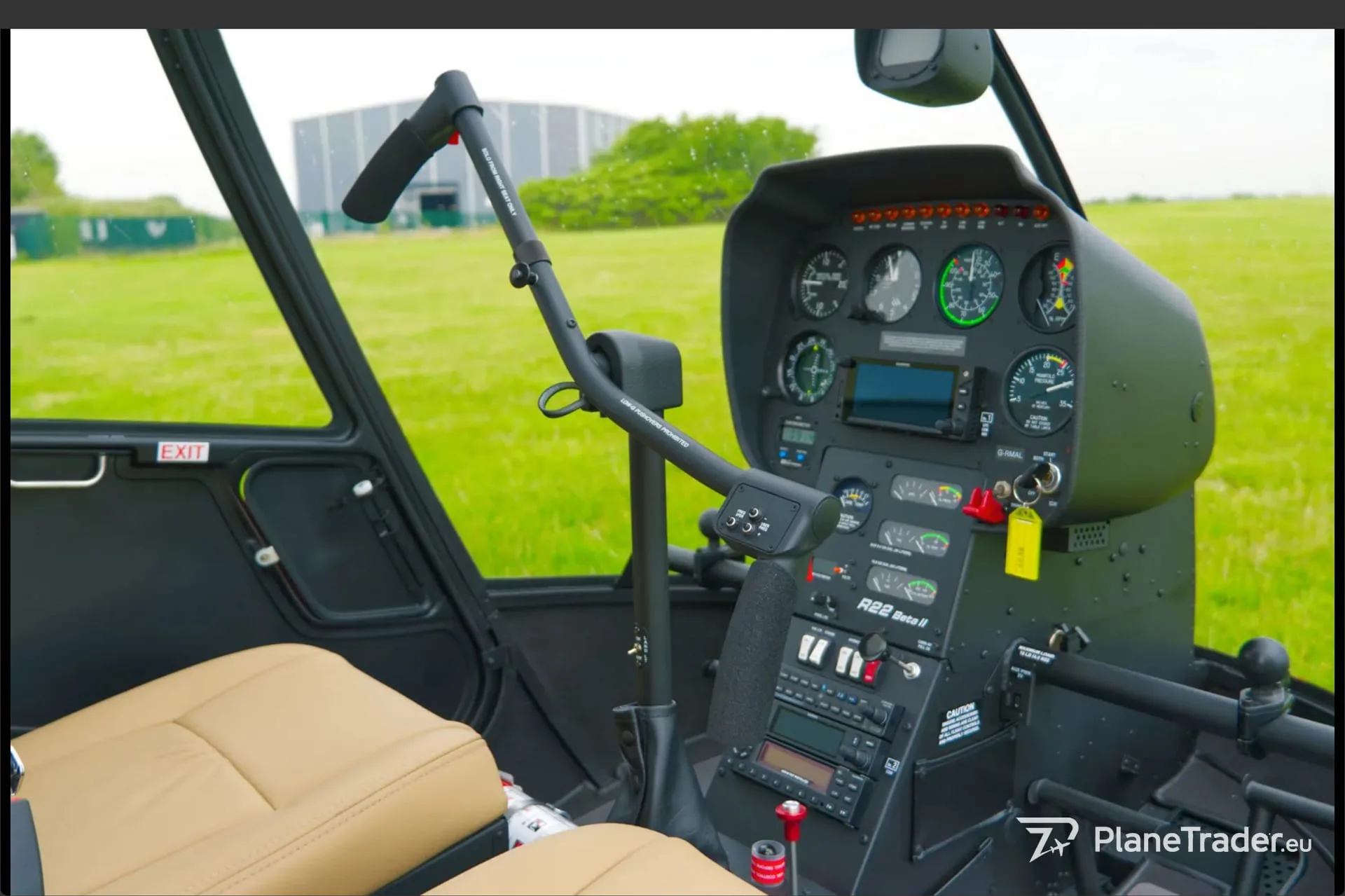 Cockpit and instrument panel of a 2026 Robinson R22 Beta II.
