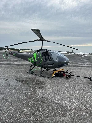 Exterior view of a 1988 Enstrom 280, N88ZH.