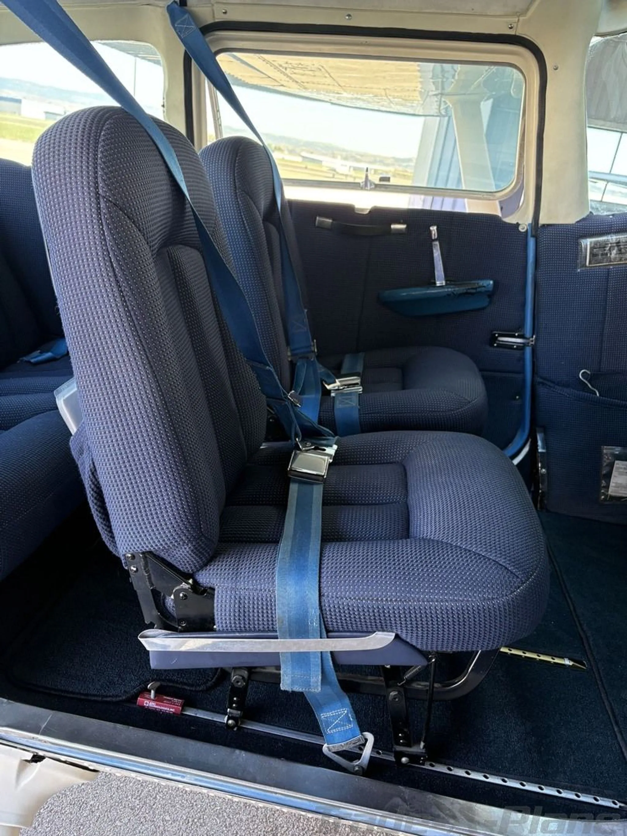 Exterior view of a 1975 CESSNA 182P SKYLANE, N9802E.