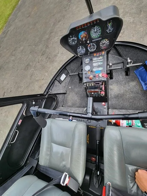 Cockpit and instrument panel of a 2001 ROBINSON R44 RAVEN I.