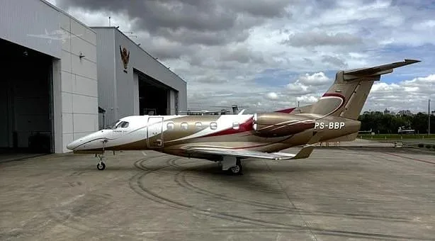 Exterior view of a 2018 Embraer Phenom 300E, PS-BBP.